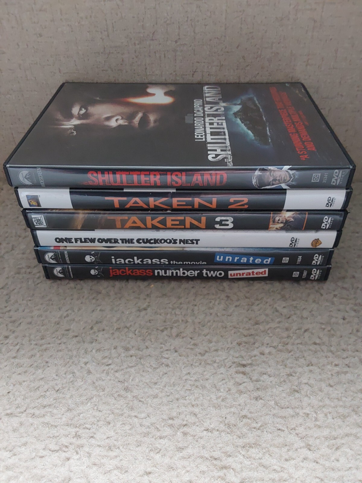 dvd lot of 6, taken, jackass, shutter island, one flew over the cuckoos nest.
